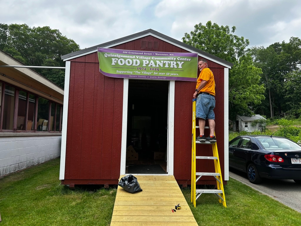 50-Year Commemorative Food Pantry Banner Installation